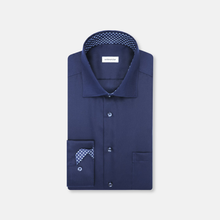 Load image into Gallery viewer, Navy blue dress shirt with polka dot details on a light gray background