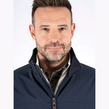 Load image into Gallery viewer, Man wearing a navy blue jacket on a white background