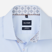 Load image into Gallery viewer, Close-up of a light blue and white micro-stripe dress shirt by OLYMP, showing the inner collar with a navy and white geometric pattern lining and black brand labels.