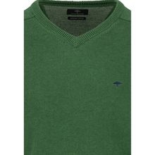 Load image into Gallery viewer, Green sweater with a small logo on a white background