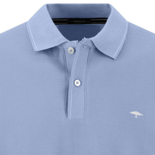 Load image into Gallery viewer, Light blue polo shirt with a small logo on a white background