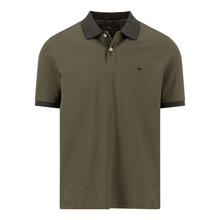 Load image into Gallery viewer, Green polo shirt with black collar on a white background