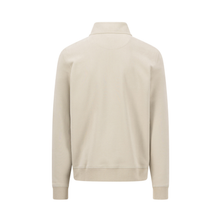Load image into Gallery viewer, A light beige long-sleeve sweatshirt shown from the back, featuring a mock neck collar, ribbed cuffs, and a ribbed hem, displayed on a solid white background.