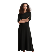 Load image into Gallery viewer, female model looking at camera wearing marco polo jersey dress in black colour
