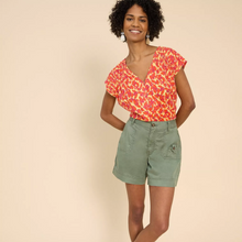 Load image into Gallery viewer, female model looking at camera wearing whitestuff top in orange colour