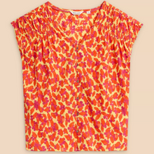 Load image into Gallery viewer, whitestuff top in orange colour showing front of top with buttons showing