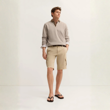 Load image into Gallery viewer, Man wearing a light gray sweater and beige shorts on a white background