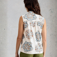 Load image into Gallery viewer, Woman wearing a sleeveless patterned top against a gray background