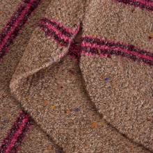 Load image into Gallery viewer, Close-up of a textured woven fabric in a heathered tan and brown color, featuring pink and dark red striped accents.