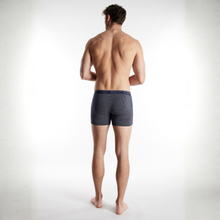 Load image into Gallery viewer, Man wearing a patterned underwear on a white background