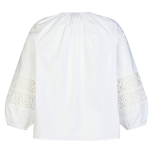 Load image into Gallery viewer, White blouse with lace sleeves on a white background