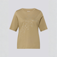 Load image into Gallery viewer, Beige t-shirt with sequin details on a light gray background