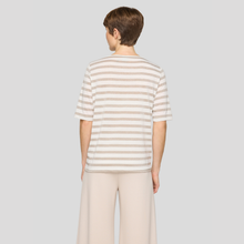 Load image into Gallery viewer, Person wearing a striped shirt and beige pants on a plain background