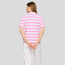 Load image into Gallery viewer, Woman wearing a pink and white striped polo shirt on a plain background