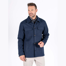 Load image into Gallery viewer, Men is wearing dark petrol blue overshirt with light grey trousers and blue patterned shirt.