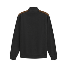 Load image into Gallery viewer, Black jacket with brown accents on a white background