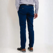 Load image into Gallery viewer, Person wearing navy blue pants and a patterned shirt on a white background