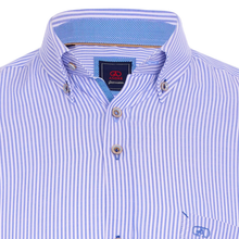 Load image into Gallery viewer, Close-up of a blue and white striped shirt with a brand label on a white background