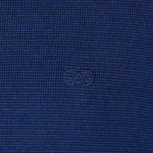 Load image into Gallery viewer, Close-up of blue fabric with a logo in the center