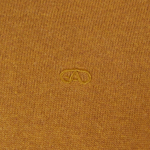 Load image into Gallery viewer, Close-up of a textured brown fabric with a logo in the center.
