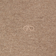 Load image into Gallery viewer, Close-up of a beige fabric with a subtle logo or brand emblem.