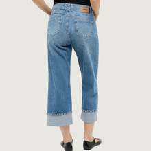 Load image into Gallery viewer, Blue jeans with a white background