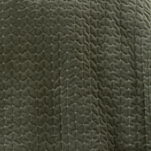Load image into Gallery viewer, Dark green quilted fabric with a diamond pattern