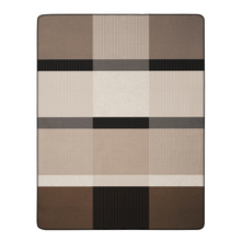 Load image into Gallery viewer, A rectangular leather accessory with a stitched border and a geometric plaid pattern in shades of brown, beige, and black, shown flat against a white background.