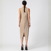Load image into Gallery viewer, Woman wearing a beige sleeveless dress on a white background