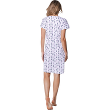 Load image into Gallery viewer, Woman wearing a white nightgown with black floral patterns on a white background