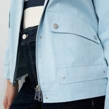 Load image into Gallery viewer, Model in blue jacket with Navy trouser and stripe top up close