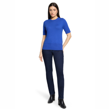 Load image into Gallery viewer, Full view of Model wearing Betty Barclay Knitted Top in Adria Blue, with a white background.