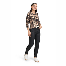 Load image into Gallery viewer, Woman wearing a leopard print top and black pants on a white background