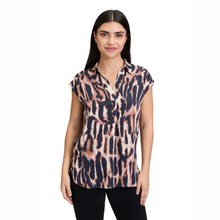 Load image into Gallery viewer, Woman wearing a sleeveless animal print top on a white background