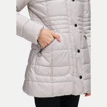Load image into Gallery viewer, White quilted jacket with black buttons on a white background