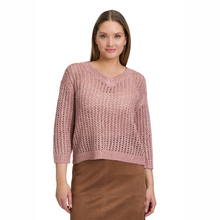 Load image into Gallery viewer, Woman wearing a pink knitted sweater on a white background