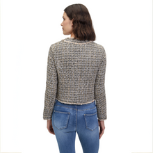 Load image into Gallery viewer, Woman wearing a tweed like jacket and blue jeans on a white background