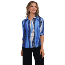 Load image into Gallery viewer, Woman wearing a blue patterned shirt on a white background