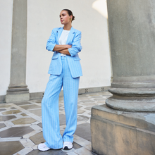 Load image into Gallery viewer, Lifestyle image of trouser Suit