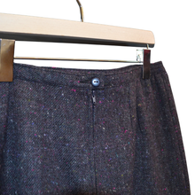 Load image into Gallery viewer, Dark gray tweed skirt on a hanger with a white background