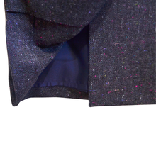 Load image into Gallery viewer, Close-up of a dark textured fabric with a blue lining