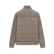 Load image into Gallery viewer, A taupe color-blocked puffer jacket with a quilted body and heathered sleeves, shown from the back on a white background.