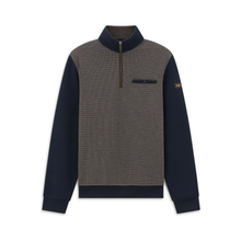 Load image into Gallery viewer, A men's quarter-zip pullover sweater with a heather gray body and dark navy sleeves, collar, and hem, featuring a small gold-toned logo patch on the right sleeve.