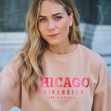 Load image into Gallery viewer, Woman wearing a pink 'Chicago University' sweatshirt with a blurred background