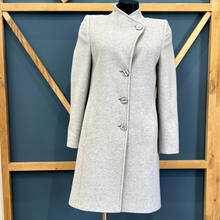 Load image into Gallery viewer, Gray coat on a mannequin against a blue wall with wooden frame