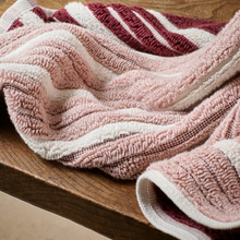 Load image into Gallery viewer, Pink and red striped towel on a wooden surface