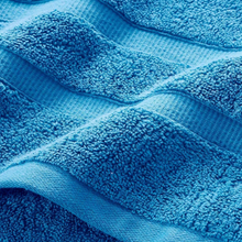 Load image into Gallery viewer, Close-up of blue towel with textured surface
