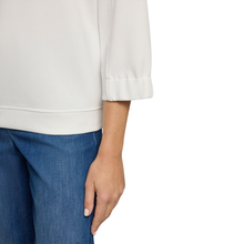 Load image into Gallery viewer, Person wearing a white top and blue pants on a white background