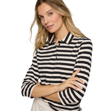 Load image into Gallery viewer, Woman wearing a black and white striped shirt on a white background