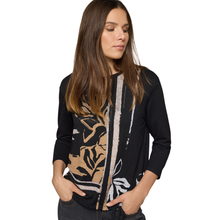 Load image into Gallery viewer, Woman wearing a black sweater with abstract patterns on a white background